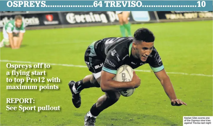  ??  ?? Keelan Giles scores one of the Ospreys nine tries against Treviso last night