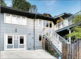  ??  ?? SET ON A quiet cul-de-sac, the shingle-clad Craftsman, built in 1912, is one of the original homes in the Hollywood Hills.