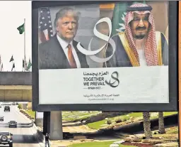  ??  ?? Donald in Arabia: A Riyadh billboard showing the prez and the Saudi King.