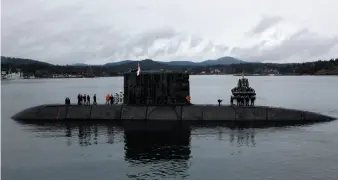  ?? CP FILE PHOTO ?? HMCS Chicoutimi seen departing on March 2 during Prime Minister Trudeau’s visit to CFB Esquimalt in Esquimalt, B.C.