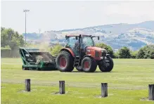  ?? PHOTO: GERARD O’BRIEN ?? Keeping up with upkeep . . . A Delta contractor works on the turf at Montecillo Park in Dunedin last week.