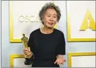  ?? CHRIS PIZZELLO AP ?? Yuh-Jung Youn, winner of the award for best actress in a supporting role for “Minari,” speaks Sunday in the press room.