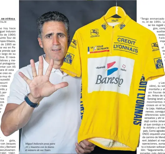  ??  ?? Miguel Indurain posa para AS y muestra con la mano el número de sus Tours.