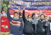  ?? SAMEER SEHGAL/HT ?? Traders during a protest against rising fuel prices and GST rules in Amritsar on Friday.