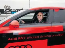  ??  ?? David Booth beat the Audi RS 7 self-driving car — barely.