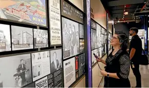  ?? AP ?? Visitors peruse the exhibits at the new Bob Dylan Centre in Tulsa.