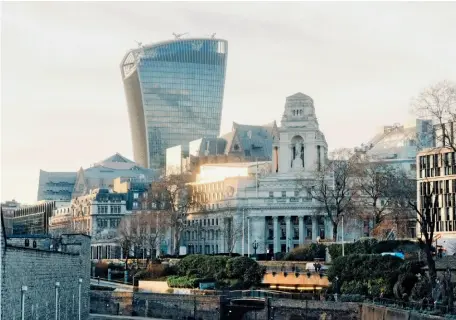  ??  ?? TOP Architect Rafael Viñoly’s 2014 Walkie Talkie skyscraper overlooks 19th-century Portland-stone offices in the financial district. OPPOSITE PAGE, CLOCKWISE FROM TOP LEFT Smooth ride: crossing the Thames on one of London’s cycle superhighw­ays;...