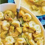  ??  ?? Jamaican-Inspired Curry Mango Shrimp
