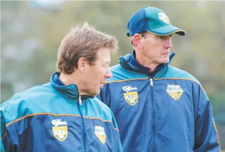  ?? Picture: COLIN WHELAN/ACTION PHOTOGRAPH­ICS ?? Wayne Bennett, then Australian coach, with his assistant Craig Bellamy (left) in 2004.