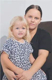  ?? Picture: GLENN HAMPSON ?? Gold Coast Kiwi Kylie Rewi, with daughter Laila, 3, says Kiwis are being treated like second-class citizens.