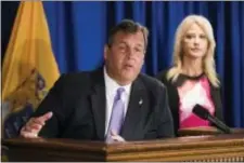  ?? MATT ROURKE — THE ASSOCIATED PRESS ?? New Jersey Gov. Chris Christie, accompanie­d by Counselor to the President Kellyanne Conway, speaks during a news conference in Trenton.