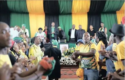  ?? PICTURE: MOTSHWARI MOFOKENG ?? SAYING GOODBYE: Thousands of ANC supporters pay their last respects to Xolani Ngcobo, who was gunned down early last week in violence linked to the ANC-SACP rift in the Inchanga area outside Durban.