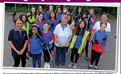 ??  ?? Clean sweep: Girl Guides take part in a litter-picking event in Harrow Harrow, north London