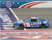  ?? JAE C. HONG/AP ?? Kyle Busch crosses the finish line to win Sunday’s NASCAR Cup race at Auto Club Speedway in Fontana, California. It was Busch’s 61st career Cup victory.