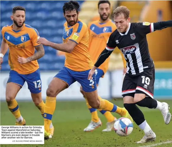  ?? LEE BLEASE/PRIME MEDIA IMAGES ?? George Williams in action for Grimsby Town against Mansfield on Saturday. Williams scored a late leveller - but the Mariners are even deeper in trouble after another win for Barrow.