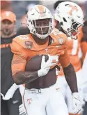  ?? SAUL YOUNG/NEWS SENTINEL ?? Tennessee running back Cameron Seldon warms up for the Vols’ game against Iowa in the Citrus Bowl on Jan. 1 in Orlando, Fla.