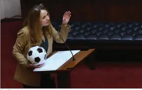  ?? (Arkansas Democrat-Gazette/Thomas Metthe) ?? Sen. Missy Irvin holds a soccer ball Wednesday while speaking about Senate Bill 354, which she said was “designed to create fairness in women’s sports.”