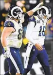  ??  ?? THE RAMS’ Jared Goff is consoled by lineman Austin Blythe after Goff’s second intercepti­on.