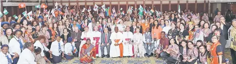  ??  ?? Uggah (seated fifth left) is seen with organisers and participan­ts. Seated from fourth left are Marino, Turkson, and Poh.