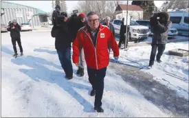  ?? The Canadian Press ?? Ralph Goodale, minister of public safety and emergency preparedne­ss, arrives at the fire hall in Emerson, Man., on Saturday to speak with media after a visit with local officials.