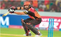  ?? AFP ?? Sunrisers Hyderabad’s Yuvraj Singh plays a shot against RCB during the IPL match. —