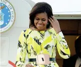  ??  ?? Michelle In questi otto anni Michelle Obama si è distinta per una grande varietà di stili. Tra i suoi nomi favoriti si ricordano: Versace, Riccardo Tisci, Jason Wu, Prabal Gurung, Tanya Taylor e Thom Browne