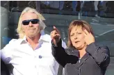  ?? DEAN HANSON/JOURNAL ?? Sir Richard Branson and then-Gov. Susana Martinez watch the White Knight II in flight Oct. 17, 2011, at Spaceport America.