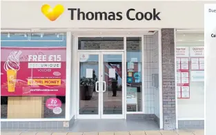  ??  ?? The Thomas Cook store in Burnley and, right, the letter on its door yesterday