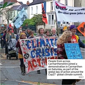  ?? WWCC ?? People from across Carmarthen­shire joined a demonstrat­ion in Carmarthen on Saturday, as part of the global day of action around the Cop27 global climate summit.