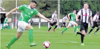  ??  ?? Action from Shepshed Dynamo’s win over Bromsgrove. Picture by Alan Gibson.