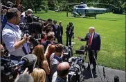  ?? CHIP SOMODEVILL­A / GETTY IMAGES ?? President Donald Trump leaves the White House on Friday to travel to Japan where he will meet with Prime Minister Shinzo Abe and new Emperor Naruhito.