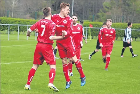  ??  ?? Carnoustie captain Steven Cook celebrates scoring his second goal in the 7-0 win over Jeanfield Swifts.