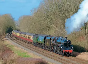  ?? NICK GILLIAM ?? BR Standard 5MT 4-6-0 No. 73156 and Bulleid Pacific No. 34072 257 Squadron pass Kinchley Lane with the 1.45pm from Loughborou­gh on January 29.