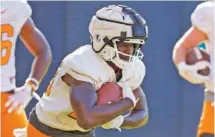  ?? TENNESSEE ATHLETICS PHOTO BY EMMA CORONA ?? Tuesday marked the first preseason scrimmage at Tennessee for running back Lyn-J Dixon, who spent the past four seasons at Clemson and spent this spring at West Virginia.