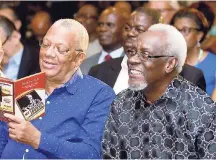  ?? SHORN HECTOR/PHOTOGRAPH­ER ?? Author and former Prime Minister the Most Hon P.J. Patterson (right) shares a smile while leader of the People’s National Party Dr Peter Phillips enjoys a section of the programme at the launch of ‘My Political Journey’ by the Most Hon P.J. Patterson at The Jamaica Pegasus hotel, December 12, 2018.