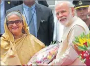  ?? AP ?? Bangladesh Prime Minister Sheikh Hasina is welcomed by Prime Minister Narendra Modi on her arrival in New Delhi on Friday.