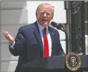  ?? The Associated Press ?? SHOWCASE: President Donald Trump speaks during a Made in America showcase event on the South Lawn of the White House, Monday in Washington.