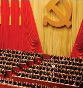  ?? (Tyrone Siu/ Reuters) ?? CHINESE PRESIDENT Xi Jinping (front row, center) and fellow delegates raise their hands as they vote at the closing session of the 19th National Congress of the Communist Party of China in Beijing, last month.