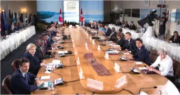  ?? — AFP photo ?? A general view of leaders attending the G7 Outreach work session at the G7 summit in La Malbaie, Canada.