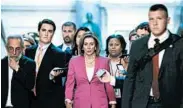  ?? ANDREW CABALLERO-REYNOLDS/GETTY-AFP ?? House Speaker Nancy Pelosi walks with reporters before the chamber voted to condemn President Trump’s remarks.