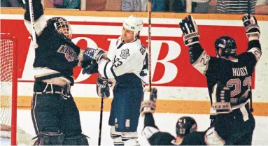  ?? PHILL SNEL GETTY IMAGES FILE PHOTO ?? Doug Gilmour — in no mood to celebrate after Kelly Hrudey, Charlie Huddy and the Kings wrapped up Game 7 of their 1993 conference final — had the wrong idea about how he was cut in a series-changing moment late in Game 6.