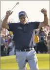  ?? DAVID J. PHILLIP — THE ASSOCIATED PRESS ?? Phil Mickelson raises his arms after becoming the oldest major winner ever at the PGA Championsh­ip on Sunday in Kiawah Island, S.C.