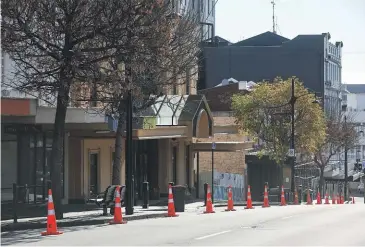  ?? AIMAN AMERUL MUNER/THE TIMARU HERALD ?? Cones along Timaru’s Stafford St yesterday afternoon.