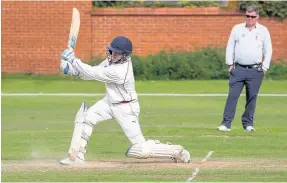  ?? New Brighton all-rounder Andy Clarke on his way to 93 against Ainsdale on Saturday. Roger Green ??