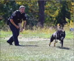  ?? Contribute­d photo / New Milford Police Department ?? After a decade of service, the New Milford Police Department said goodbye to retiring K-9 Kira, pictured with her handler, Sgt. Michael LaFond.