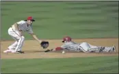  ?? PABLO MARTINEZ MONSIVAIS/ASSOCIATED PRESS ?? Washington Nationals second baseman Anthony Rendon got the ball in time to tag out Arizona Diamondbac­ks’ Gerardo Parra, who was caught stealing in Arizona’s 3-2 win.