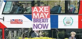  ?? DANIEL LEAL-OLIVAS/GETTY-AFP ?? A sign demanding Britain's Prime Minister be sacked is carried near Parliament on Friday.