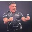  ?? FOTO: DPA ?? Am Ziel: Gerwyn Price bejubelt den WM-Sieg.