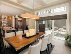  ?? Photos: Albi Homes ?? The dining room faces a back deck in the Carrara by Albi Homes in Artesia.