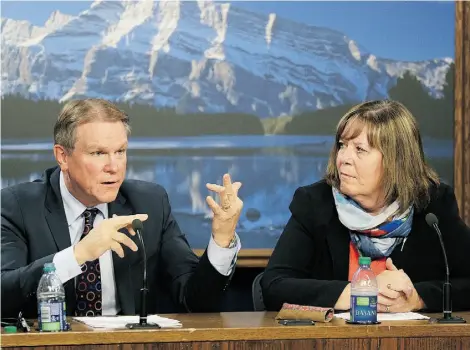  ?? LARRY WONG/EDMONTON JOURNAL ?? Dave Mowat, left, president and CEO of ATB Financial, was named Friday by Energy Minister Marg McCuaig-Boyd, right, to lead the review of Alberta’s royalty system. But the hazy announceme­nt came with no terms of reference or timeline.